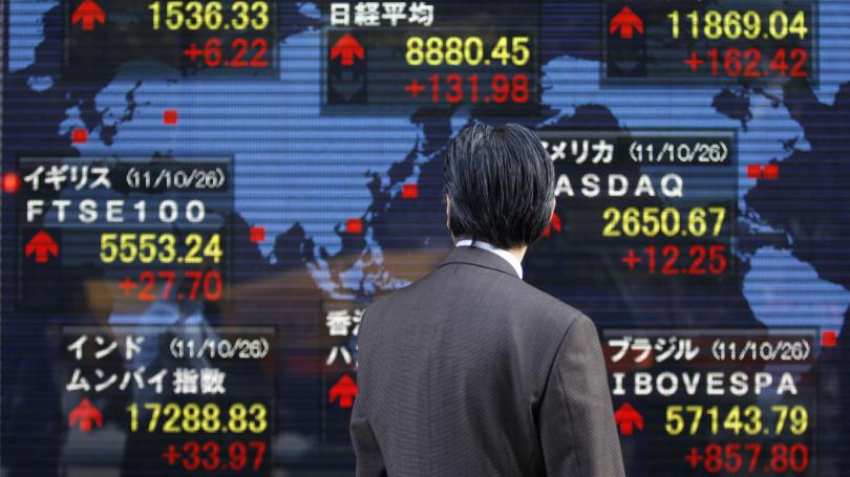 Asian shares fall under pressure from trade, emerging markets worries