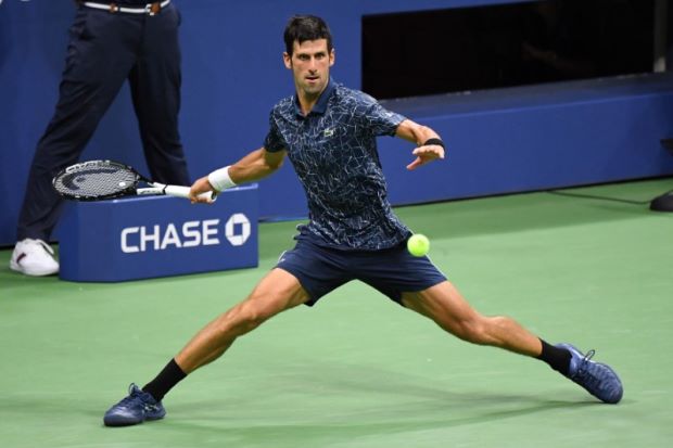 Djokovic overcomes blip to beat Sandgren at US Open