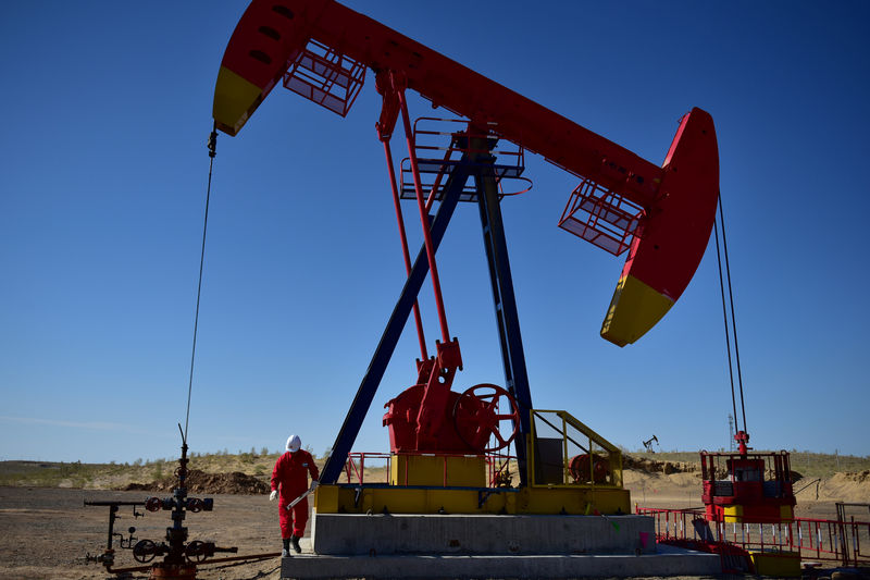 Oil prices rise, but still set for weekly fall amid equities rout