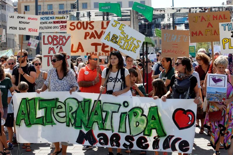 Thousands march in French cities to demand action against climate change