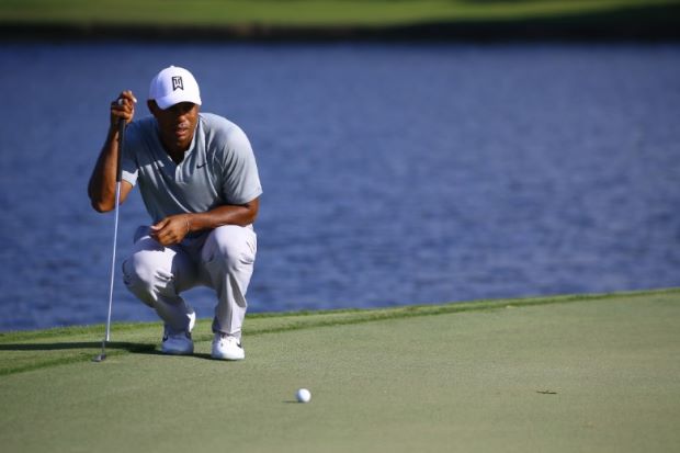 Woods, Rose tied for halfway lead at Tour Championship