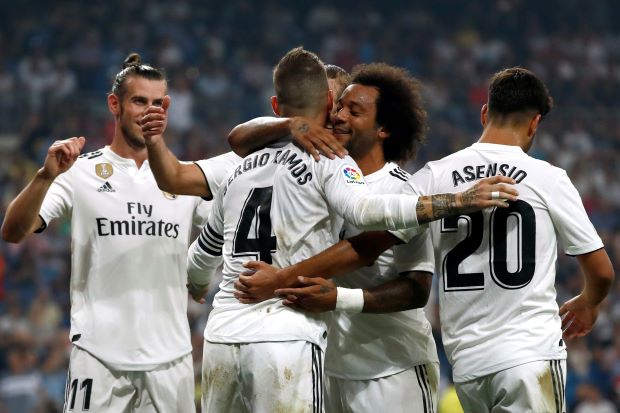 Real Madrid extend perfect start, Atletico lose at Celta