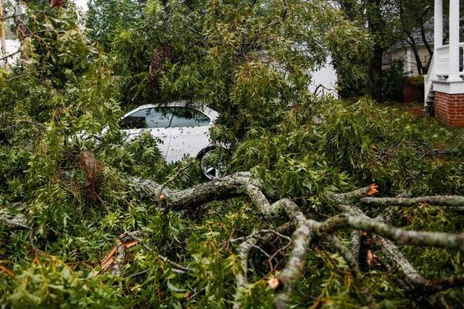 Florence plows inland, leaving five dead, states flooded