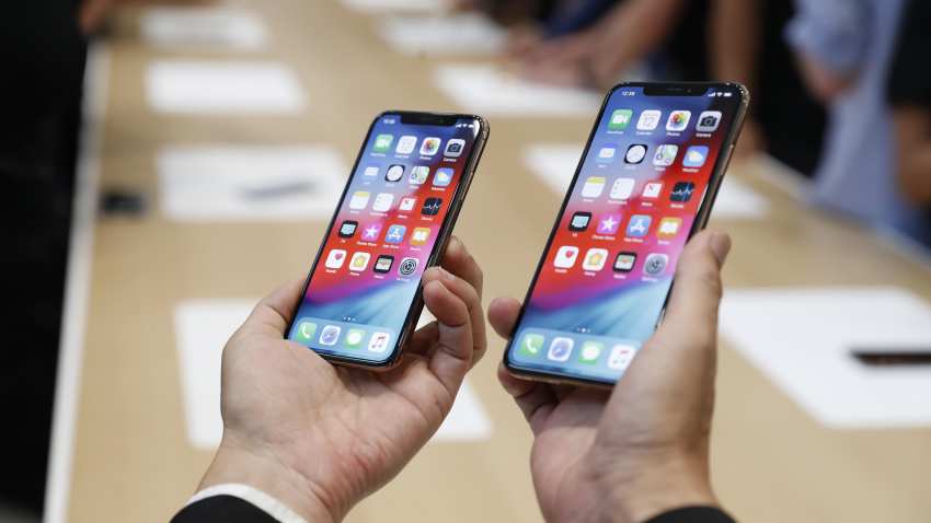 Apple iPhones get bigger and pricier, Watch turns to health