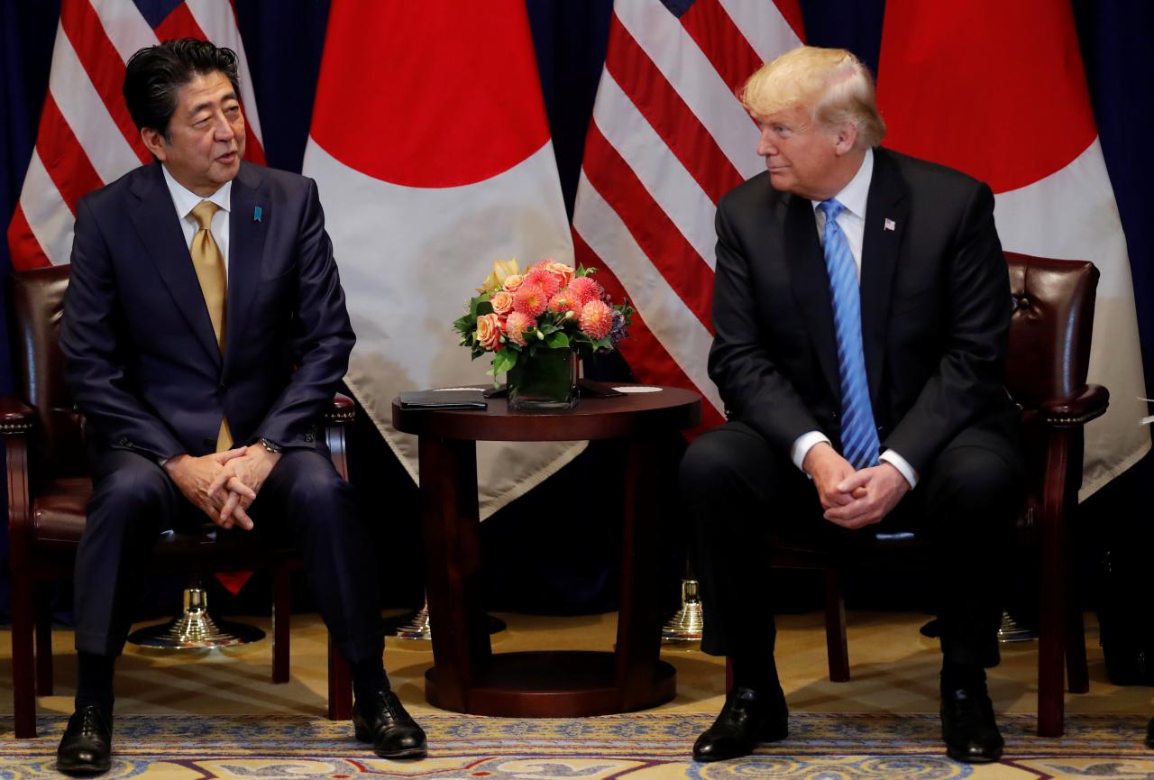 Japan dodges US auto tariffs, for now, as Trump and Abe agree on trade talks