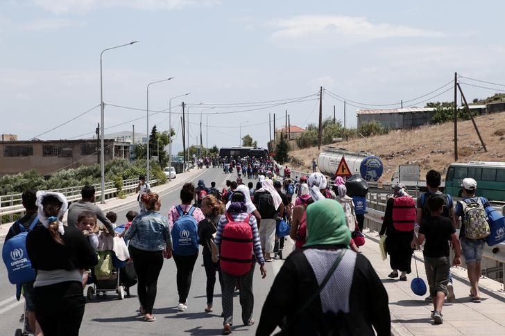 For women in Greek migrant camps, even showers are unsafe - Amnesty