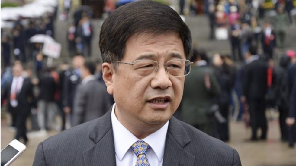 China's top Macau liaison official dead after fall from building