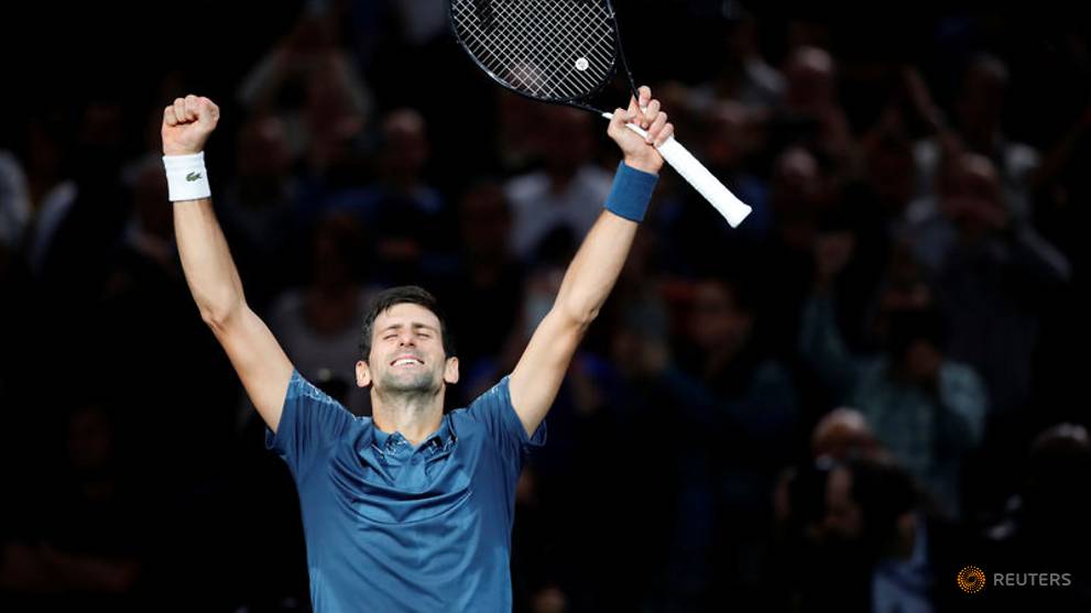 Under the weather Djokovic staves off Cilic challenge