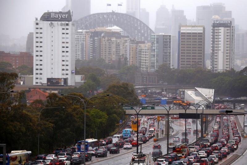 One in 100 year storm lashes Australia; gale-force winds elsewhere fan fires