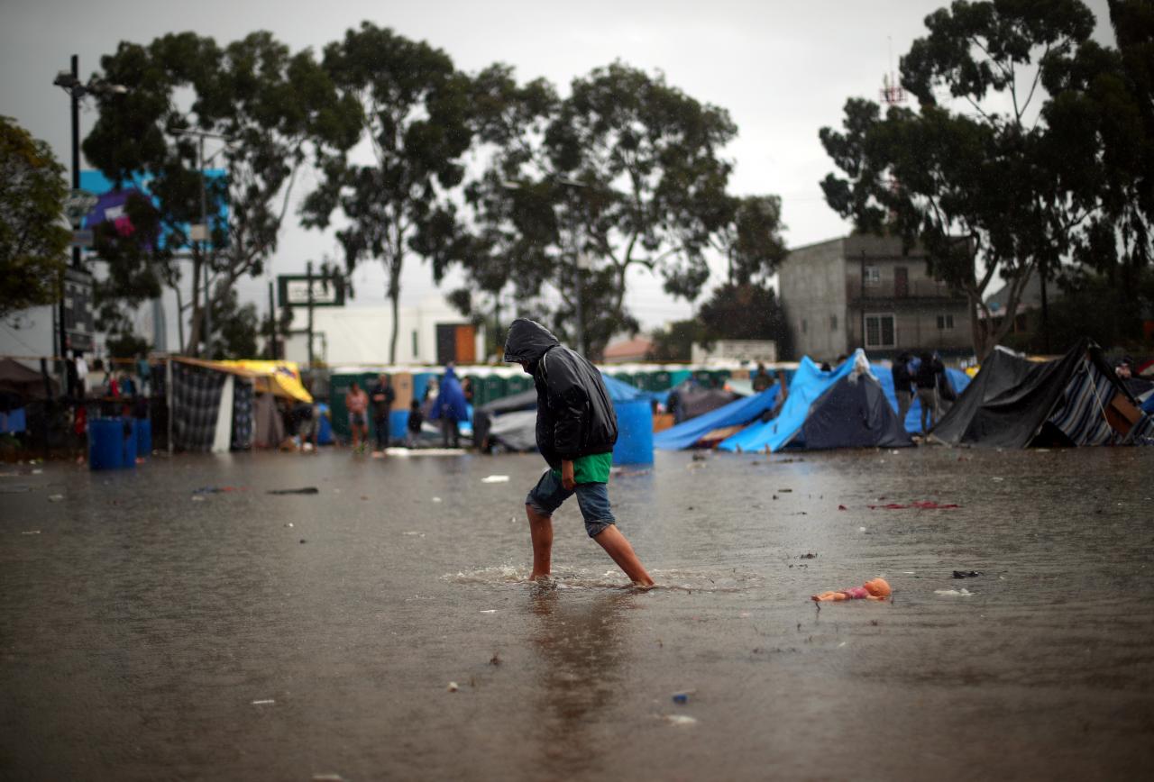 Handful of caravan migrants launch hunger strike at US border