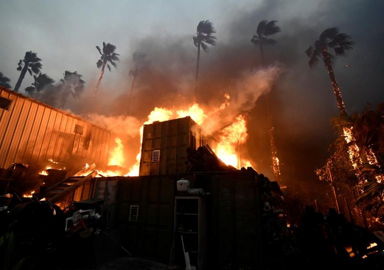 Wildfires rage in California, Trump blames 'forest mismanagement'