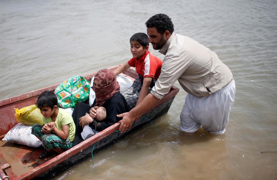 Several dead, thousands flee homes in Iraq floods