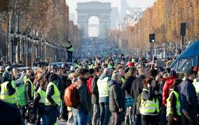 French protesters rail against Macron's fuel taxes with road blocks