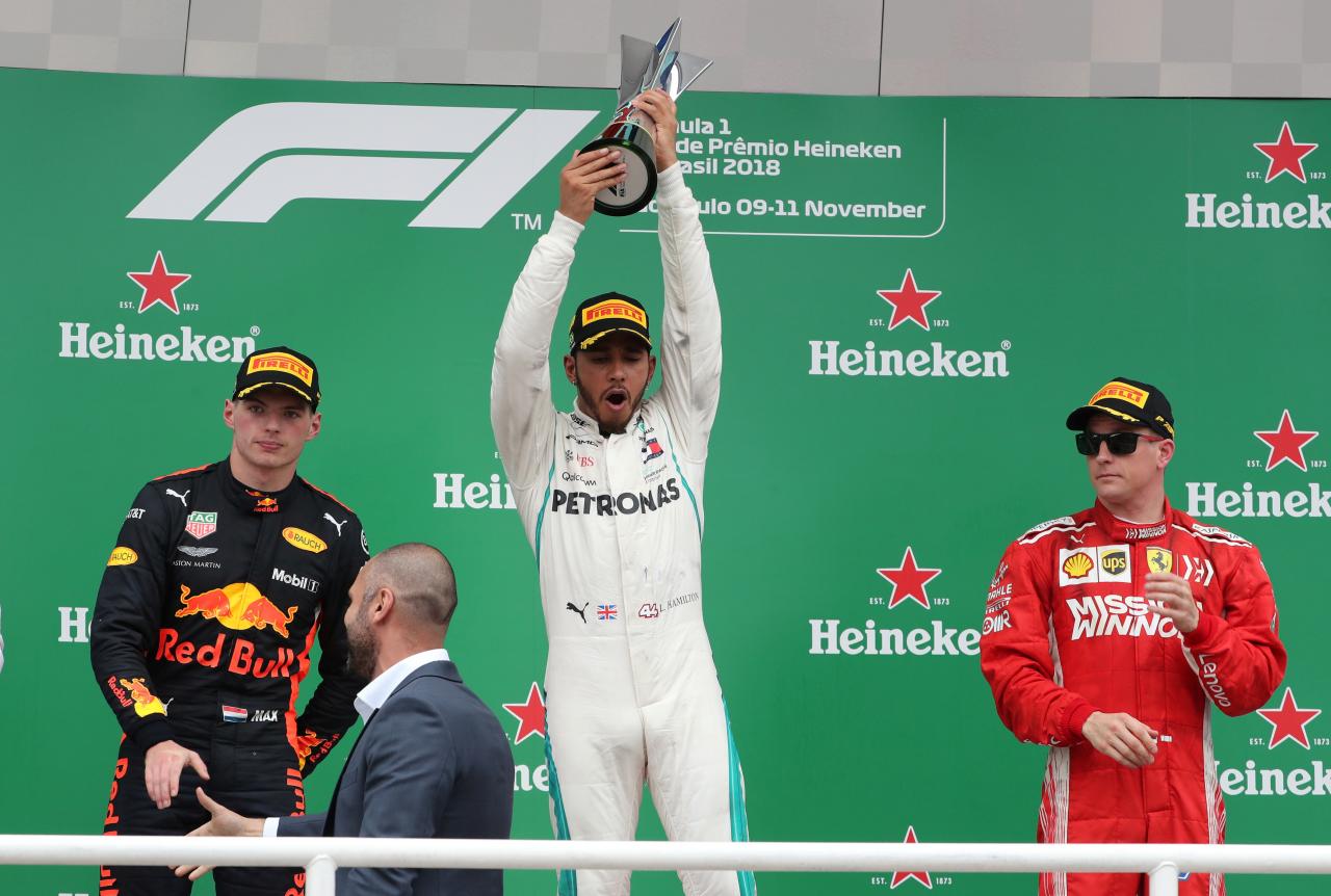 Hamilton wins in Brazil as Mercedes take fifth F1 title