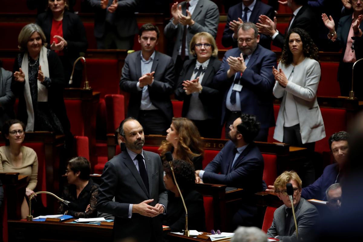 Macron makes U-turn on fuel-tax increases in face of 'yellow vest' protests