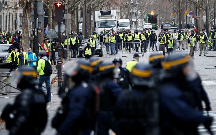 France's 'yellow vests' clash with police in Paris