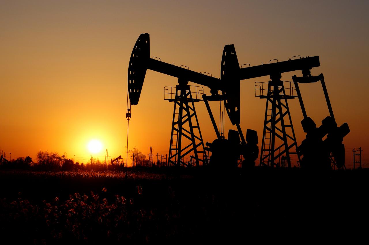 Oil prices dip on signs of economic slowdown, but OPEC-led cuts provide support