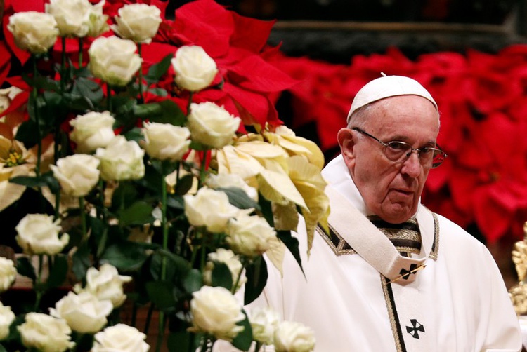 Remember the poor and shun materialism, pope says on Christmas Eve