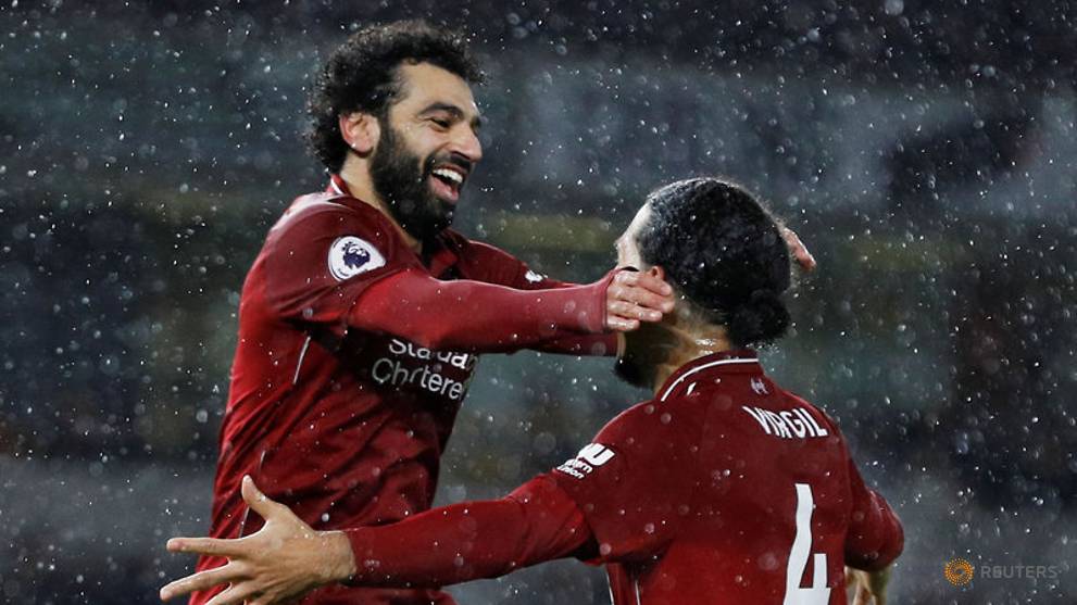 Liverpool seal Christmas top spot as Salah and Van Dijk sink Wolves