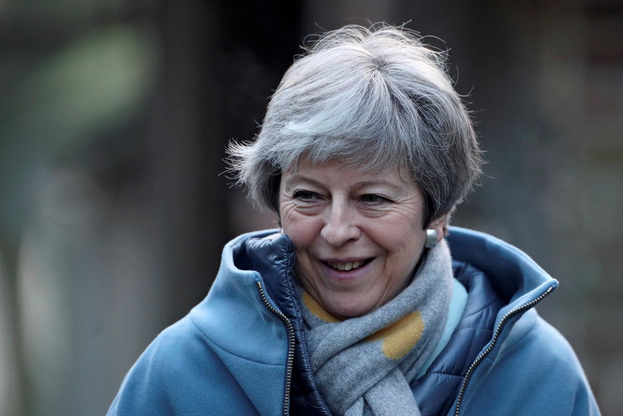 May seeks more time to find Brexit deal, tells lawmakers: Hold your nerve