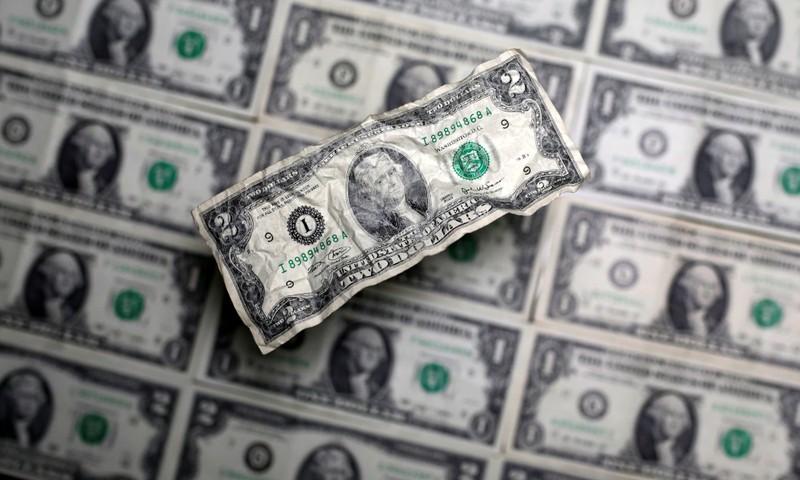 Dollar slips on Powell views; optimism on trade talks aids Aussie dollar