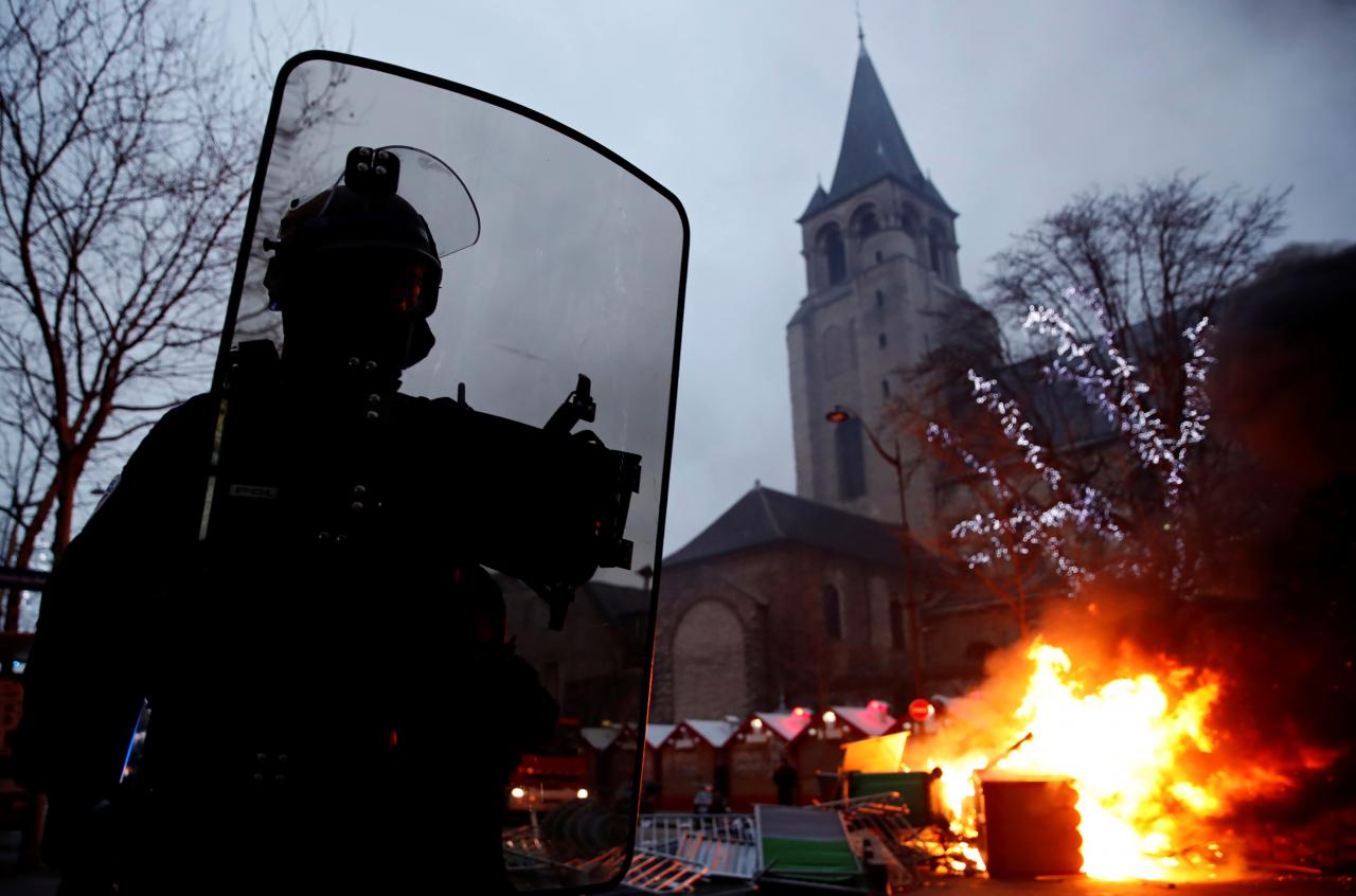 France's Macron reeling as tough stance against 'yellow vests' backfires