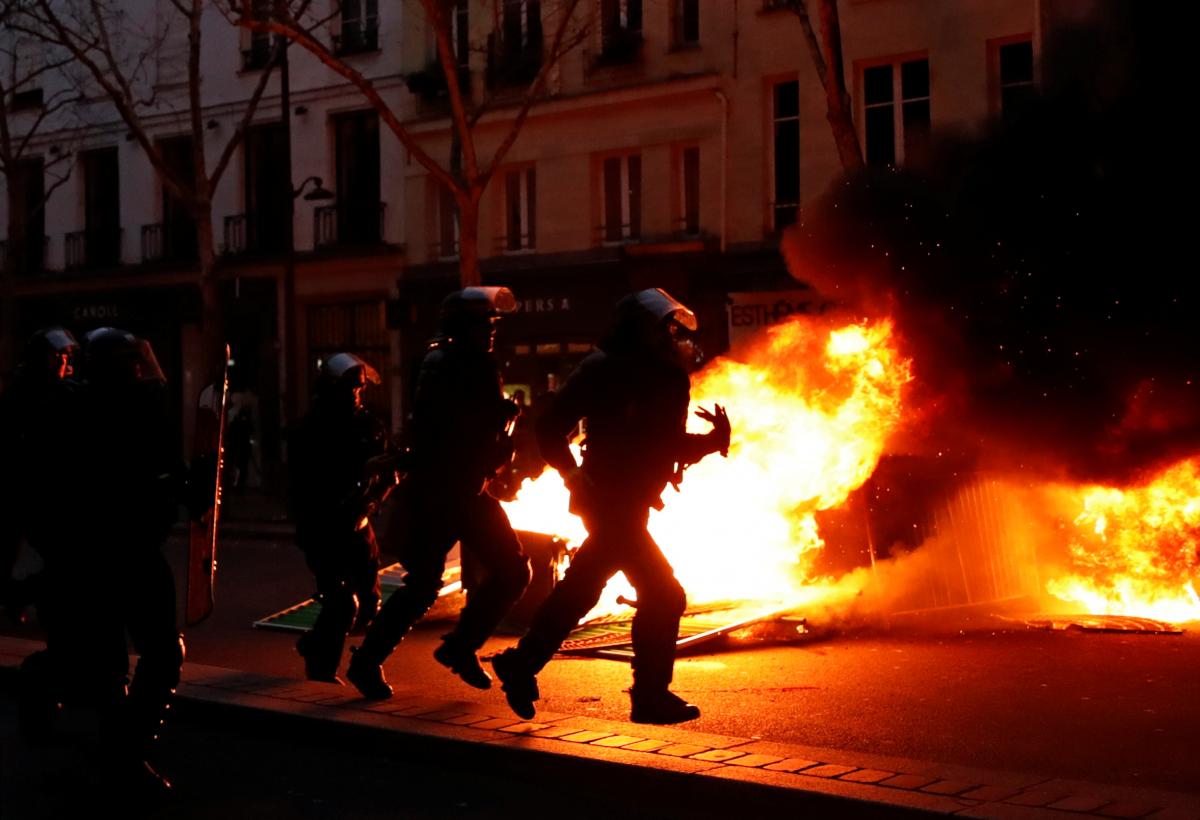 Clashes erupt in Paris as 'yellow vests' protest at unrepentant Macron