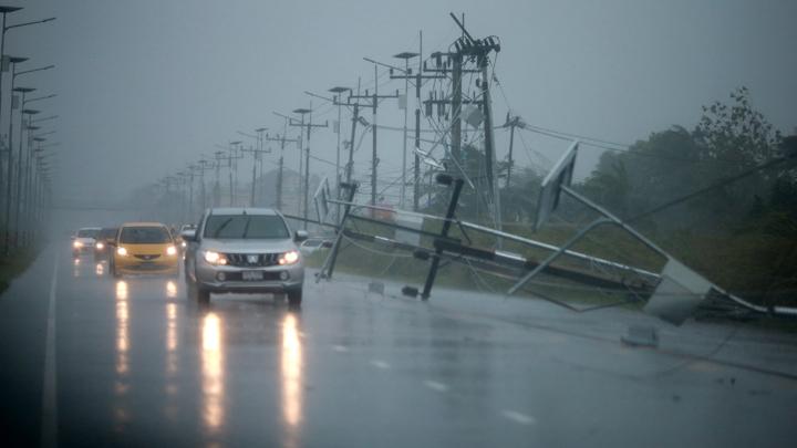 Thailand resumes flights, ferry services as tropical storm slows