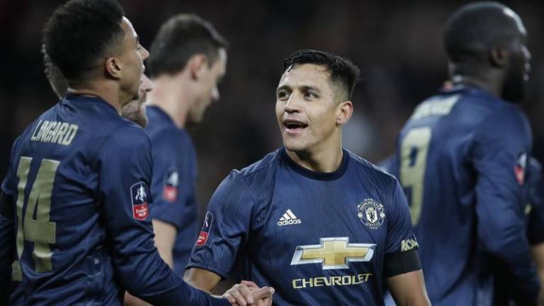 United's Sanchez returns to haunt Arsenal in Cup win