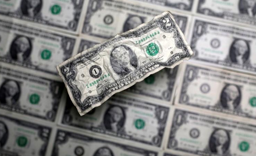 Dollar slips as trade progress boosts risk assets; kiwi soars