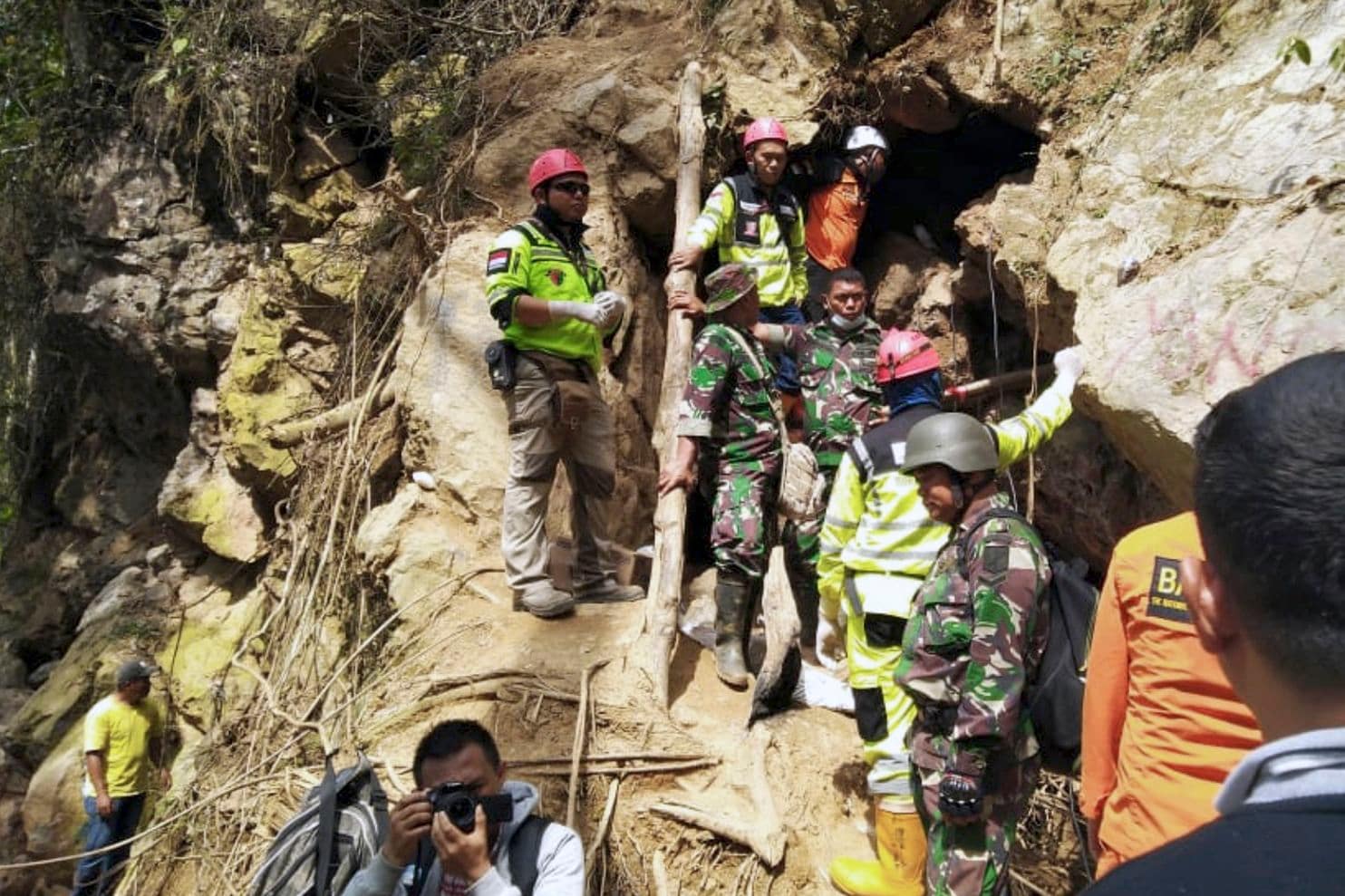 Indonesian rescuers amputate miner's leg to save him from collapsed mine