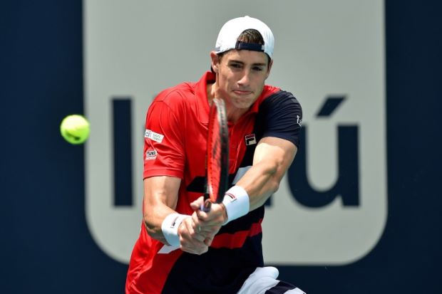 Federer to face Isner in Miami final