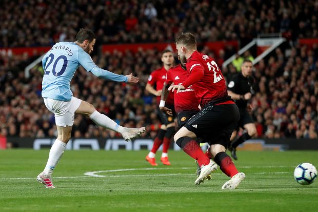 Manchester City take big step towards title with derby win at United