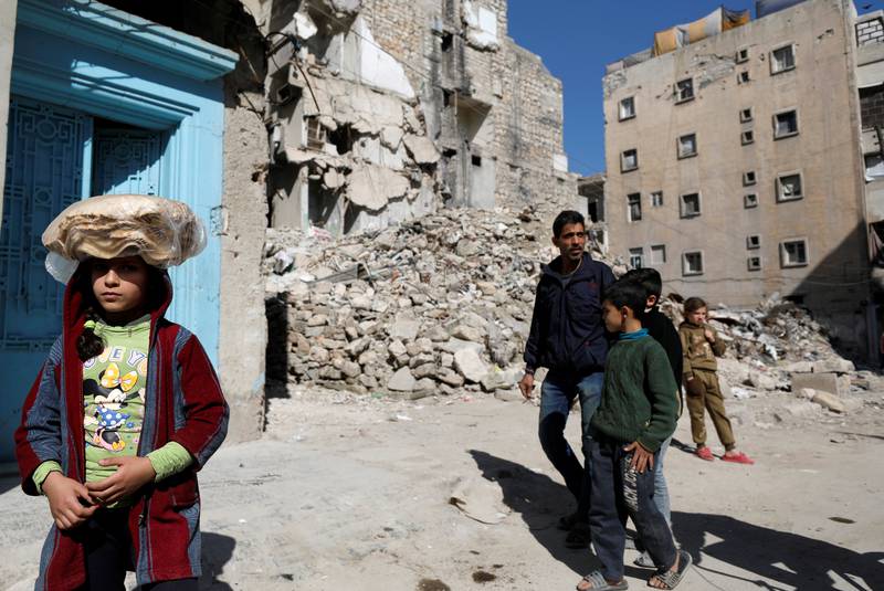 In east Aleppo, bodies still under rubble show limits of Syria's recovery