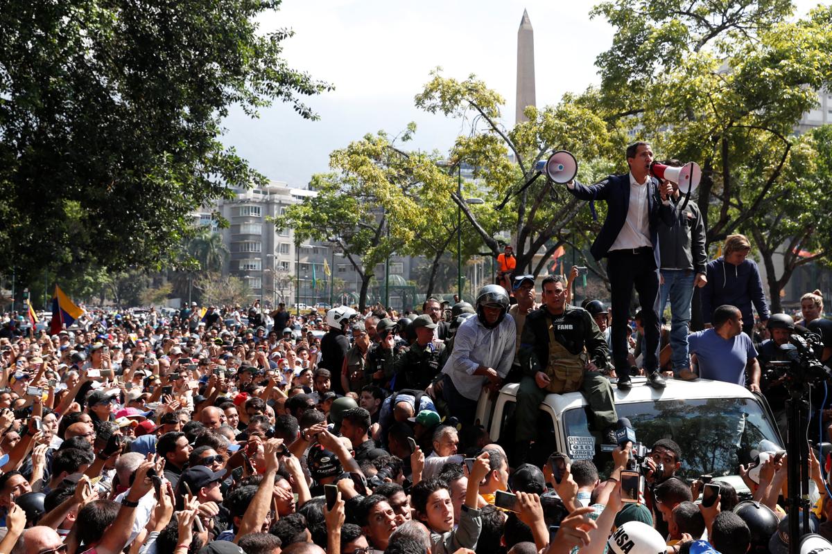 Venezuela's Guaido calls for largest march in history in uprising effort