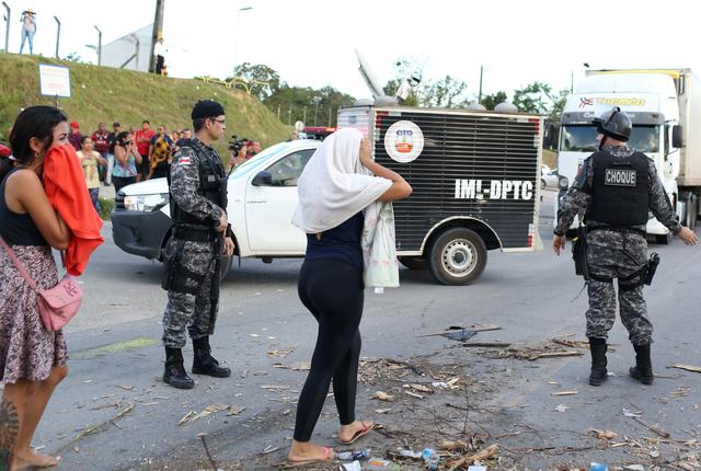 At least 57 inmates strangled to death in Amazon prison gang clashes