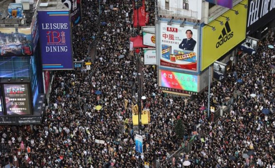 Hong Kong protests resume as masses march amid high security