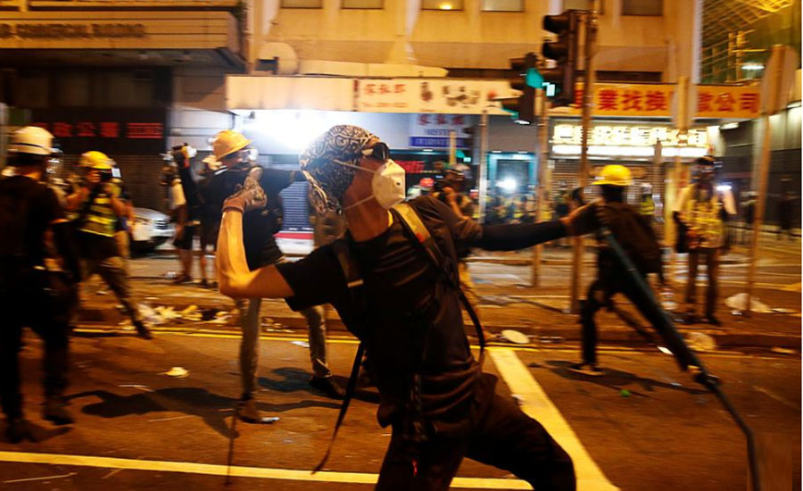 Hong Kong police fire rubber bullets, tear gas as protests descend into chaos