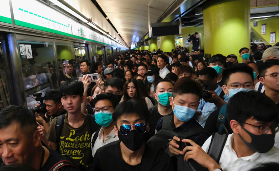 Hong Kong protesters disrupt train services