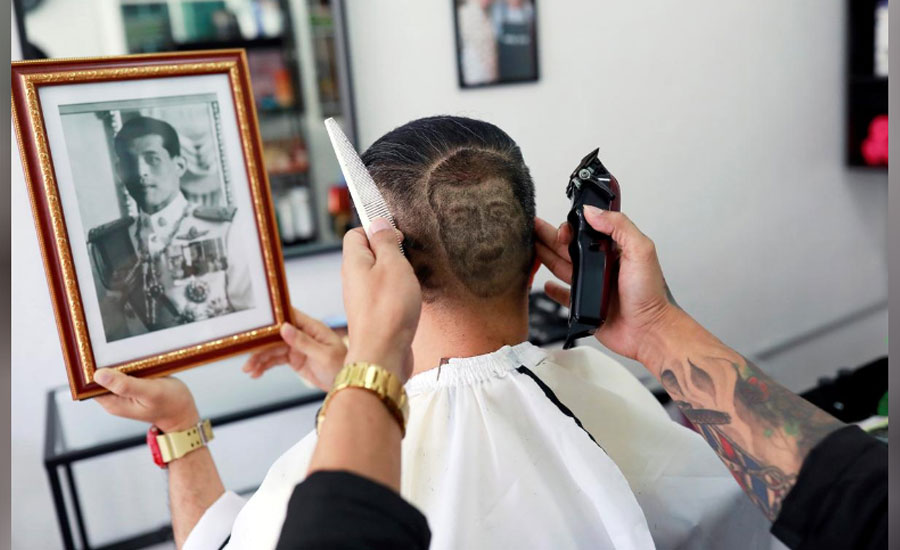 Fit for the king? Thai monarchist's birthday haircut