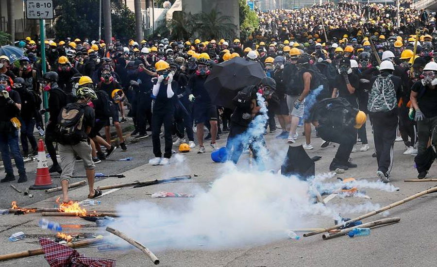 Protests chaos grips Hong Kong with tear gas, water cannon and pouring rain