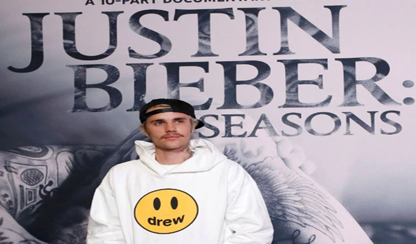 American singer Justin Bieber says he's working to recover from partial face paralysis