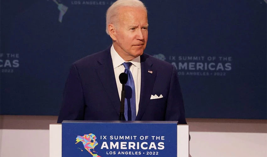 Facing record inflation, Biden chides Exxon, oil companies for profits