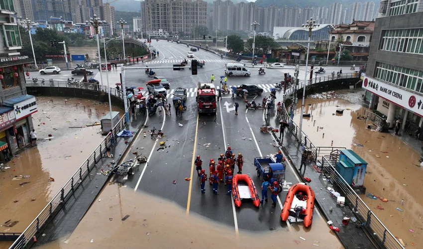 Hundreds of thousands evacuated in China after heaviest rains in decades