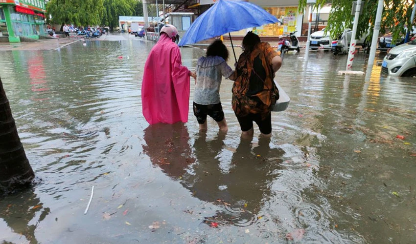 China lashed by year's first typhoon, record rains forecast