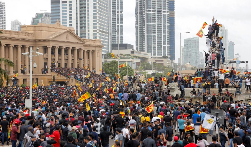 Sri Lanka protesters storm president's house, set fire to PM's residence