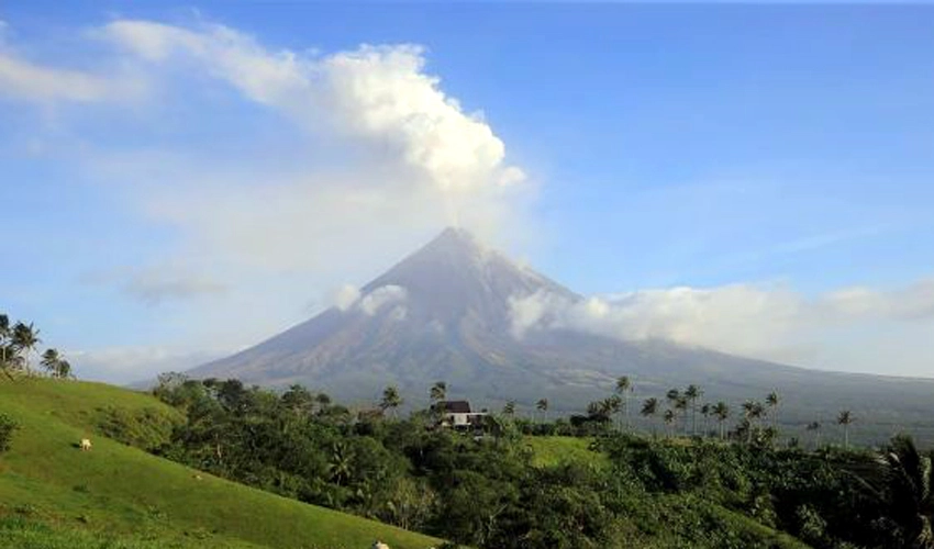 Philippines on alert as volcano spews ash