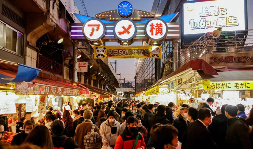 Japan's population falls while foreign residents rise to record