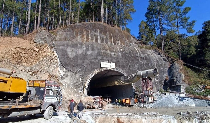 Indian rescuers battle to save 40 workers trapped in collapsed tunnel