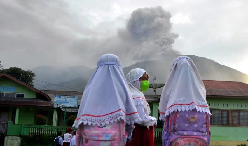 Eleven climbers killed as Indonesia volcano erupts, search on hold